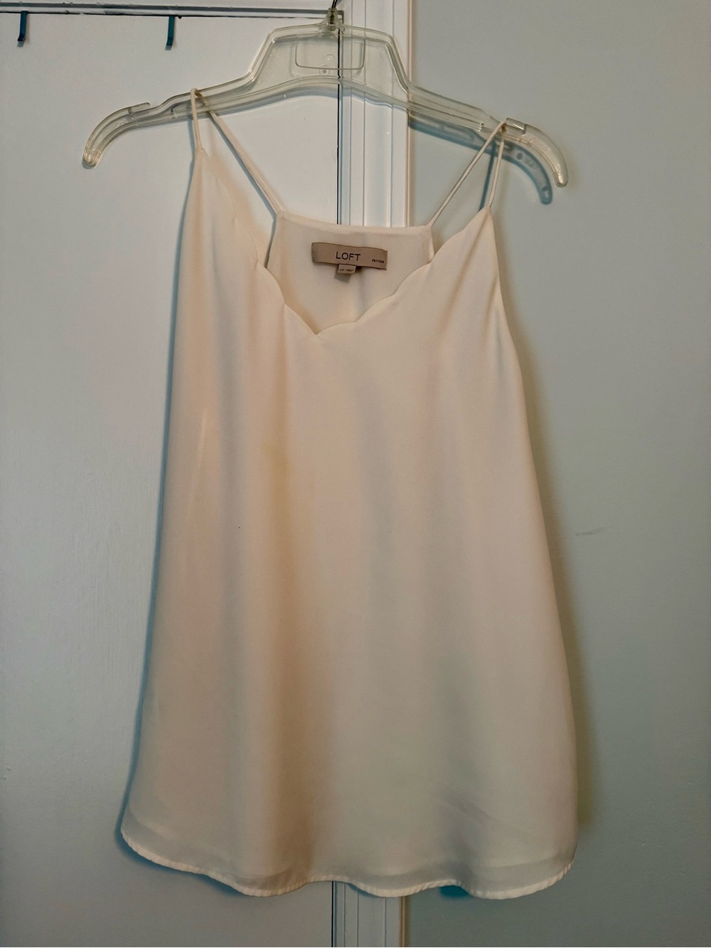 Cream colored Loft size medium, sheer shell blouse